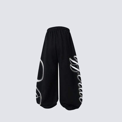 Metal Stud Graffiti Letter Print Curved Wide Leg Sweatpants WN27905