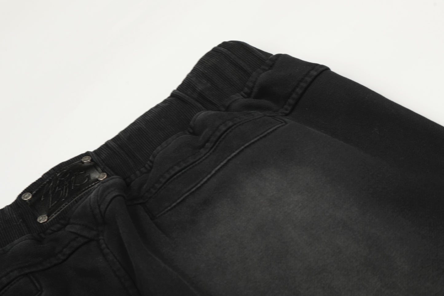 Deconstruction Washed Dirty Curved Sweatpants WN26134