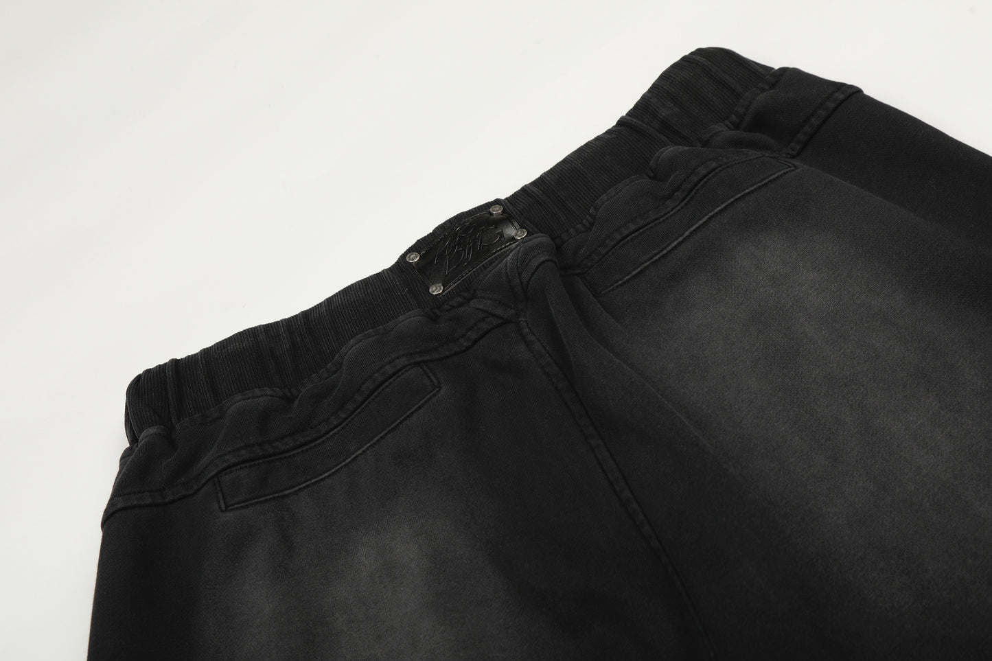 Deconstruction Washed Dirty Curved Sweatpants WN26134