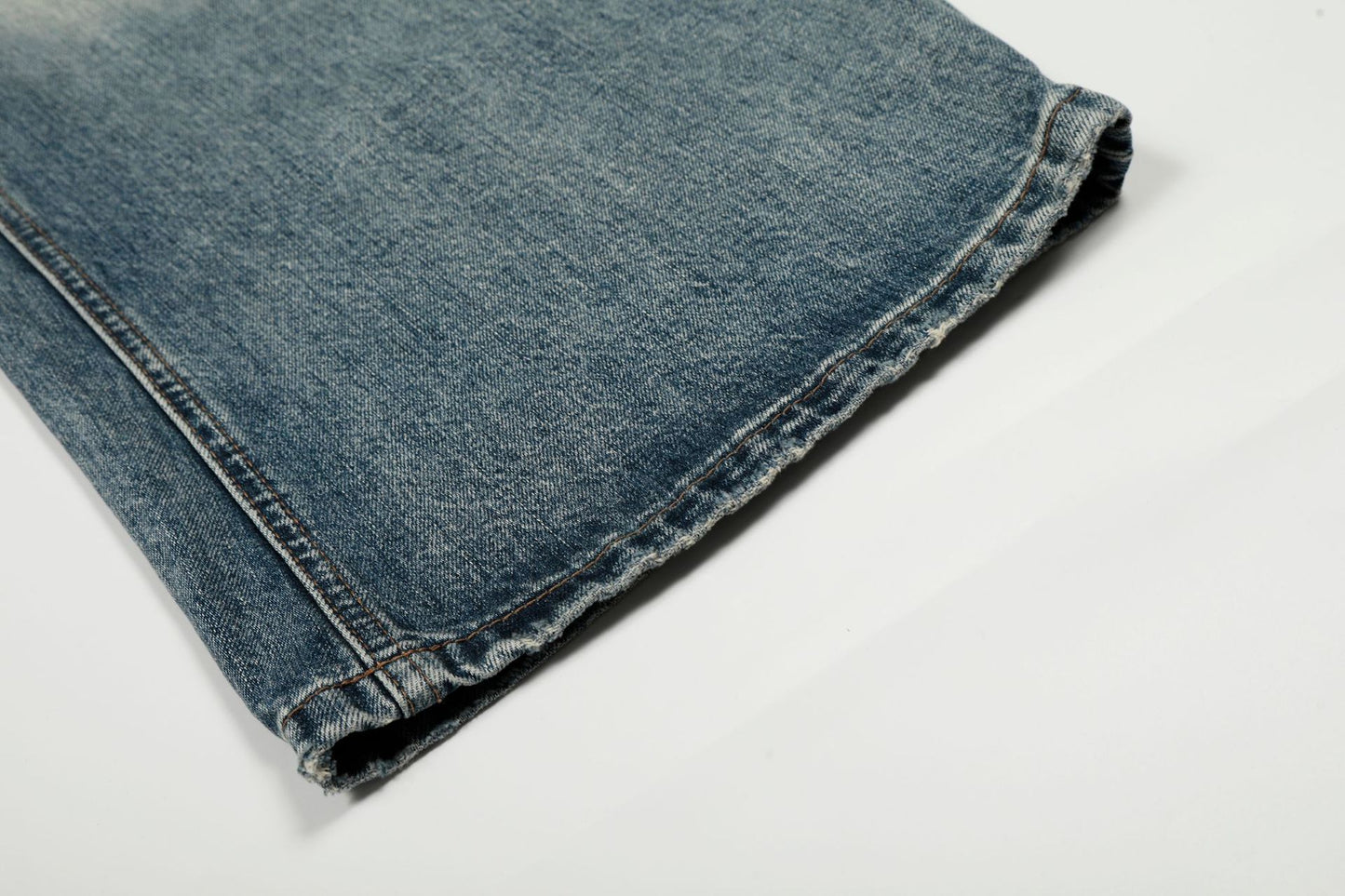 Washed Whisker Damage Curved Denim Jeans WN25863