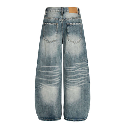 Washed Whisker Damage Curved Denim Jeans WN25863