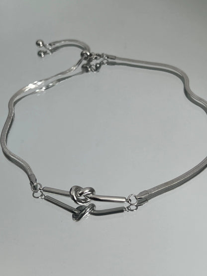 Knotted Snake Bone Titanium Steel Necklace WN19235