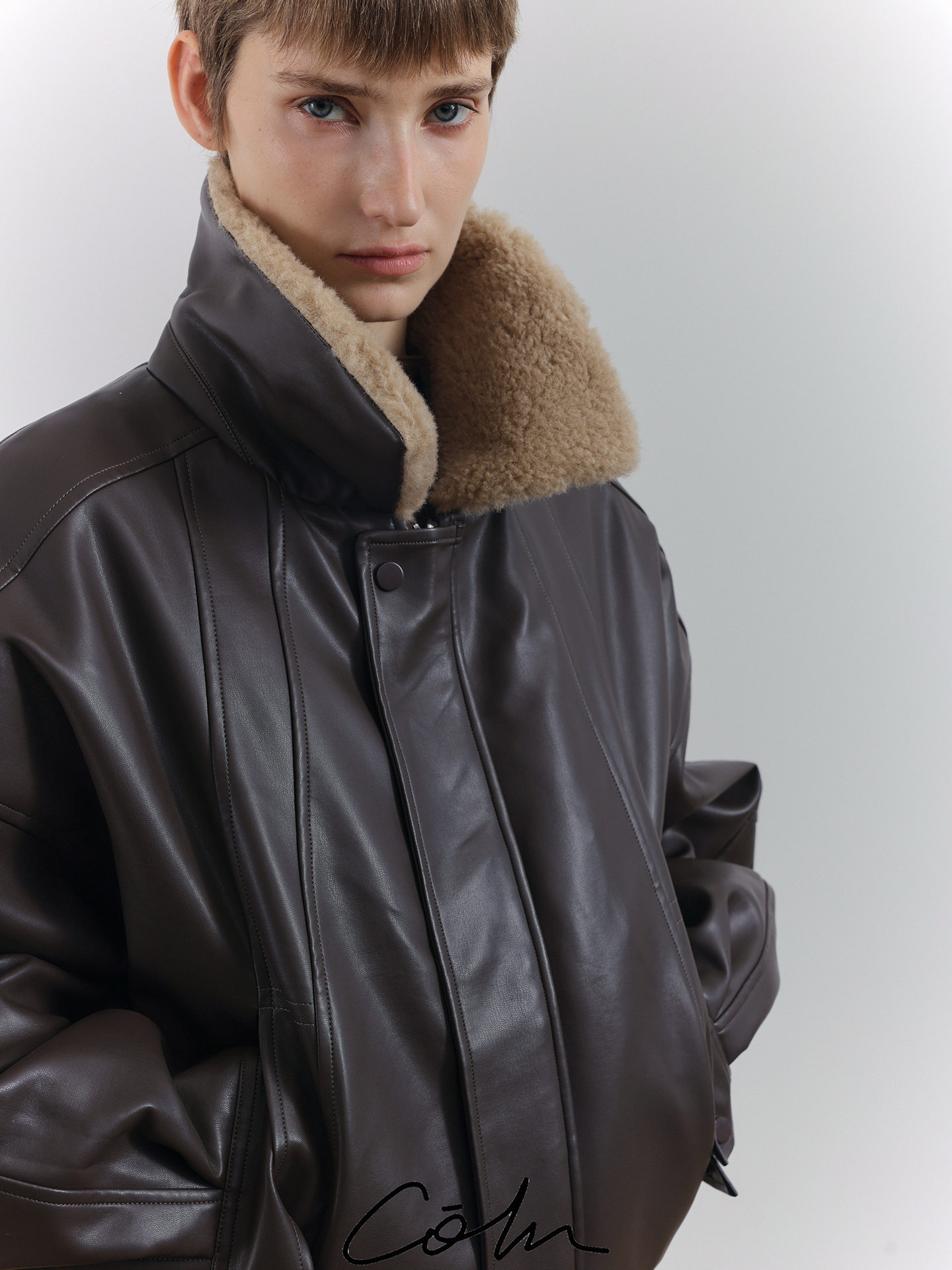 Fake Fur Collar PU Leather Puffer Jacket WN21678