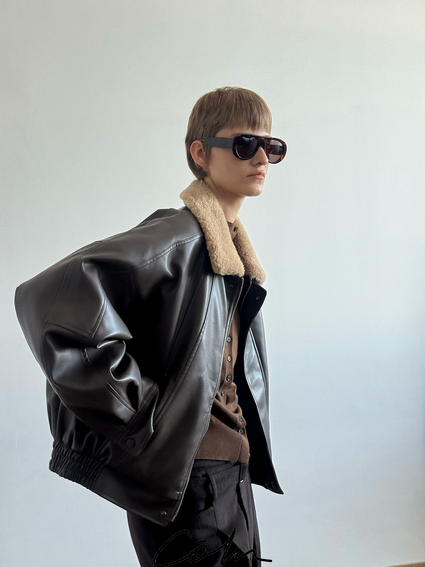 Fake Fur Collar PU Leather Puffer Jacket WN21678