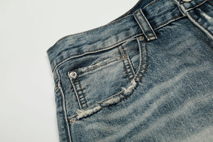 Washed Whisker Damage Curved Denim Jeans WN25863
