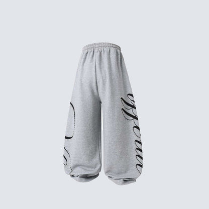 Metal Stud Graffiti Letter Print Curved Wide Leg Sweatpants WN27905