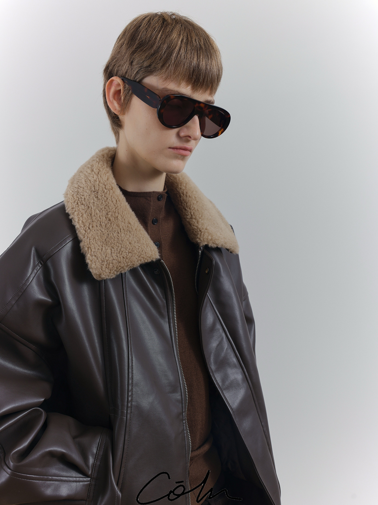 Fake Fur Collar PU Leather Puffer Jacket WN21678