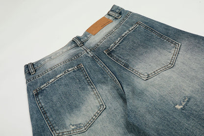 Washed Whisker Damage Curved Denim Jeans WN25863