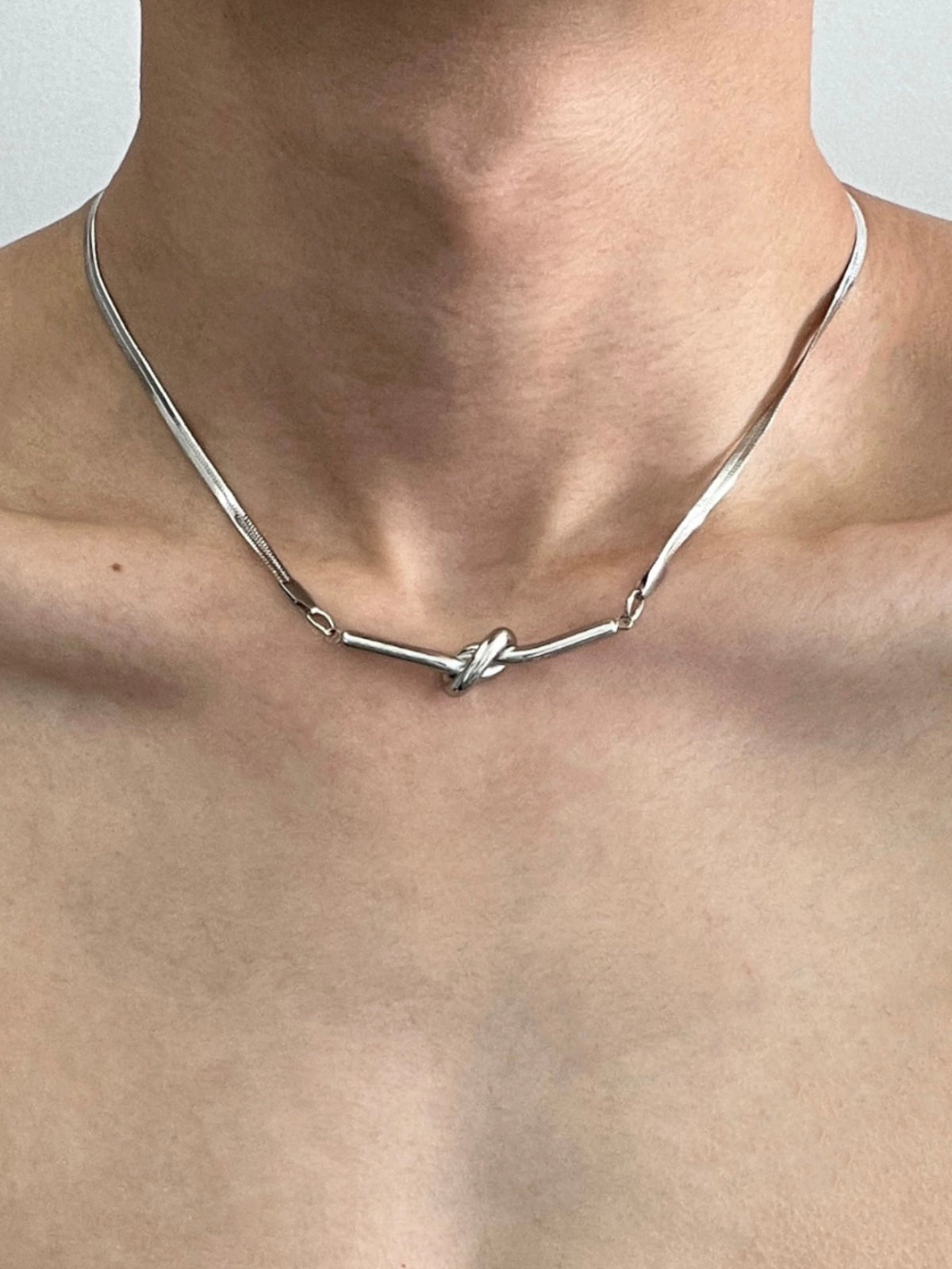 Knotted Snake Bone Titanium Steel Necklace WN19235