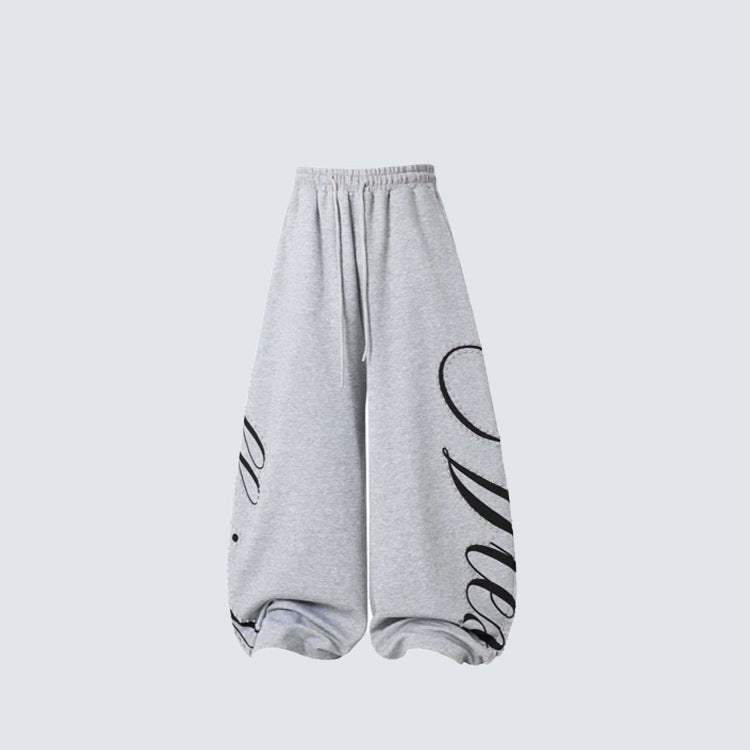 Metal Stud Graffiti Letter Print Curved Wide Leg Sweatpants WN27905