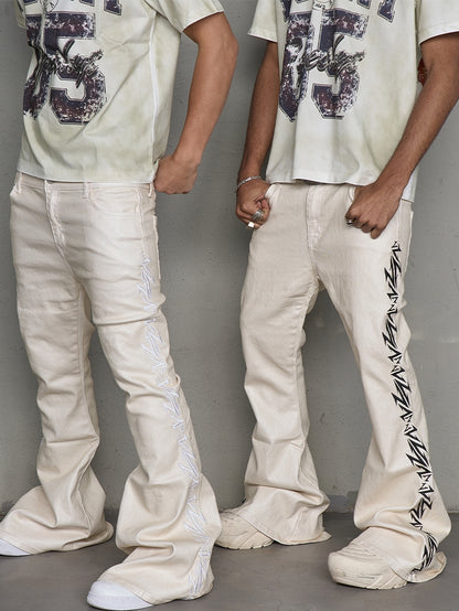 Waxed Embroidery Flare Stacked Denim Jeans WN21006